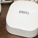 Truly, this is what the Eero 6 looks like: a rectangular puck amongst a mess of cables.